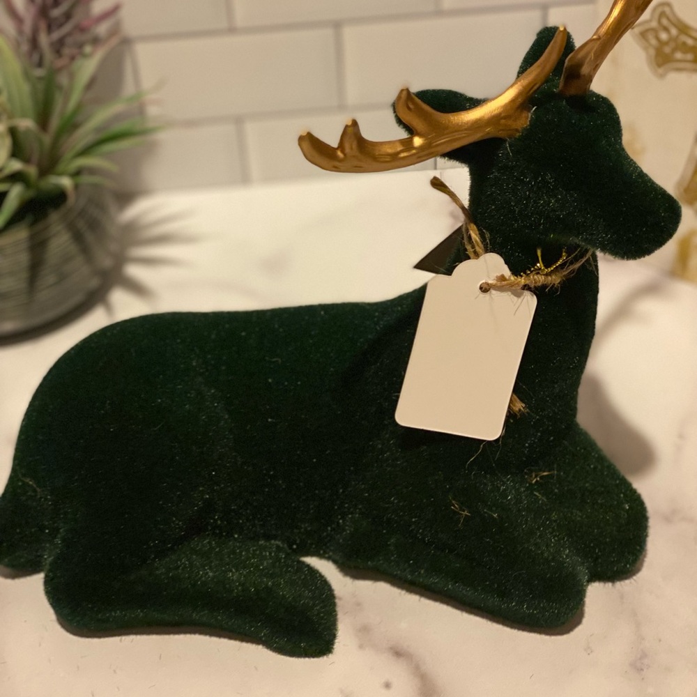 Large sitting deer by Bethany Lowe